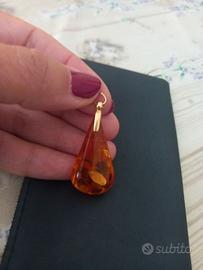 Ciondolo oro 18k e ambra