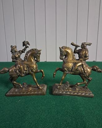 2 reggilibri in ottone o bronzo 