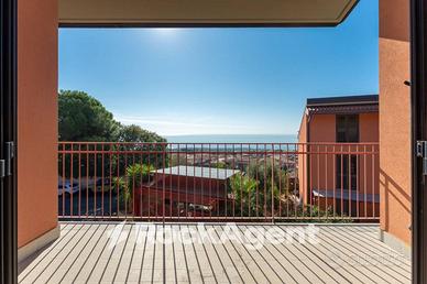 VILLA A SCHIERA CON GARAGE E GIARDINO