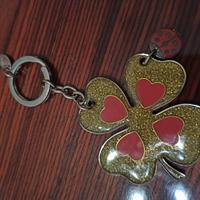 Portachiavi a quadrifoglio e coccinella