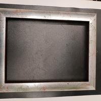 Cornice legno foglia argento 