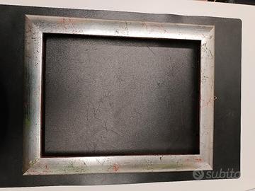 Cornice legno foglia argento 