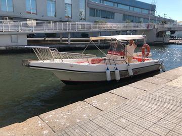 Atività di escursioni + motoscafo