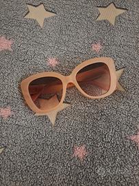 Occhiali da sole rosa con protezione UV
