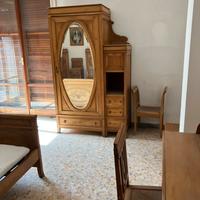 Camera da letto d’epoca in legno massello