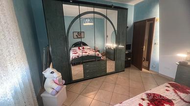 Camera da letto ,tavolino porta tv.