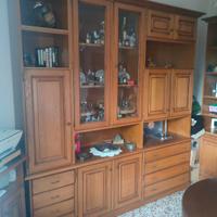 Sala completa di angoliera e libreria 