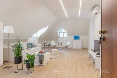 Attico / Mansarda di 127 m² con più di 5 locali e 