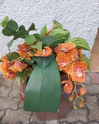 Composizione di fiori in plastica 