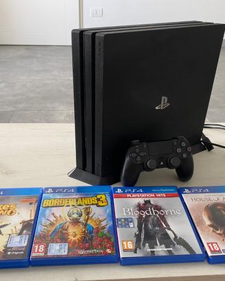 PS4 Pro 1To + 1 controller + 4 videogiochi