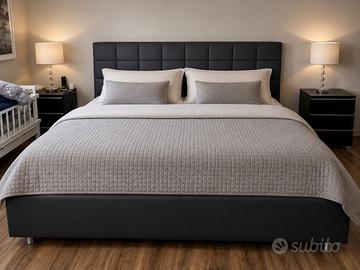 Letto matrimoniale 200x200 con testiera imbottita