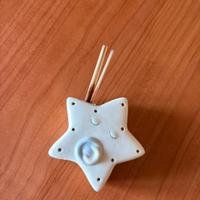 Piccola lampada stella di ceramica porta profumo