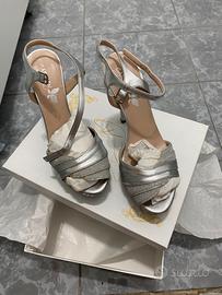 Sandalo laminato e pelle argento artigianale