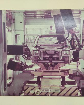 POSTER RIGIDO FIAT UNO MK1-MK2 IN FABBBRICA  83-95