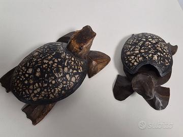 statuine in legno tartarughe
