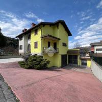 PORZIONE DI BIFAMILIARE A ONORE