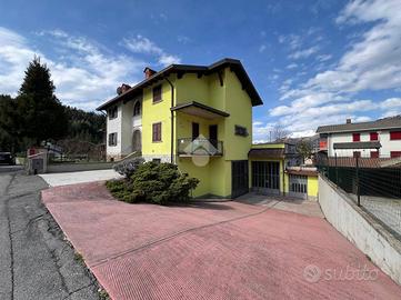 PORZIONE DI BIFAMILIARE A ONORE