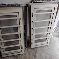 finestra in alluminio con grata con controtelaio