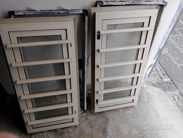 finestra in alluminio con grata con controtelaio