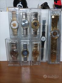 lotto Swatch 7 quarzo 1 automatico 