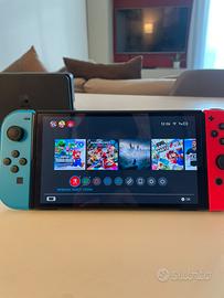 Nintendo Switch OLED + Accessori + Giochi
