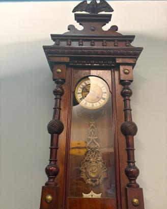 Orologio a pendolo con decoro acquosa