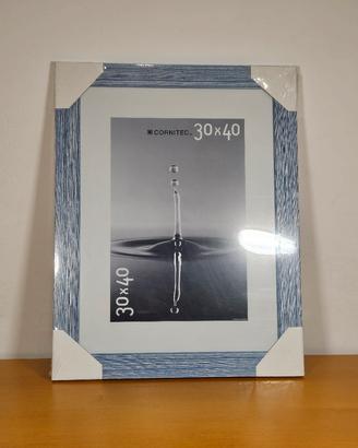Cornice grande azzurra nuova