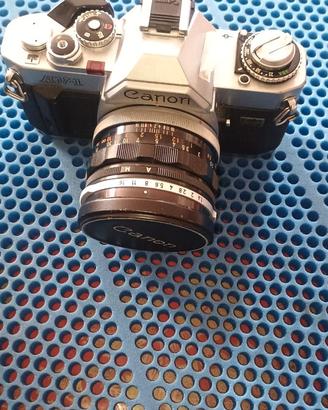 FOTOCAMERA CANON AV-1 con OBIETTIVO 50 mm