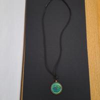 Ciondolo vintage con ologramma.