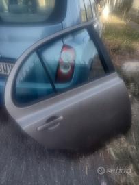 porta post . Nissan micra