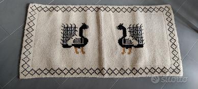 Tappeto sardo tecnica "a pibiones"