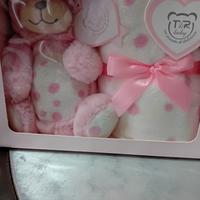 copertina in pile e pupazzo