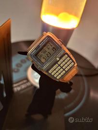 Casio 1276 DBC 63 Data Bank vintage anni 90 Giallo