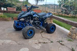 quad 125