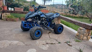 quad 125
