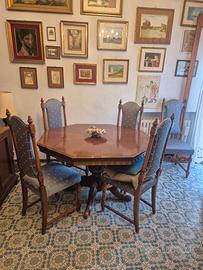 tavolo con sedie e tavolino con lampada