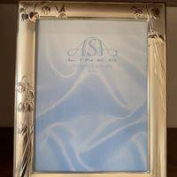 Cornice in argento
