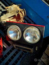 fari anteriori Ferrari Mondial 1986
