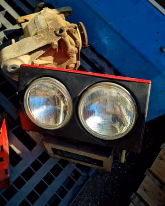 fari anteriori Ferrari Mondial 1986