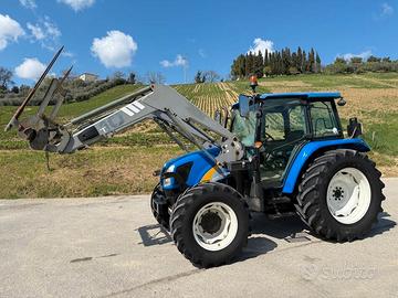 New Holland T5060 con caricatore frontale MX