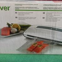 Macchina per sottovuoto con sacchetti di scorta 