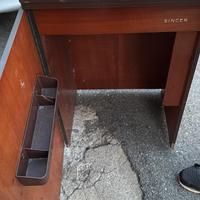 Mobile singer macchina cucire