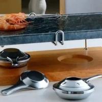 pietra ollare con base in legno