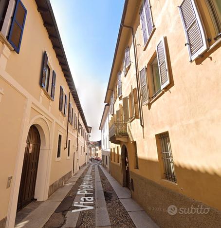 Stanza singola con balcone e scansore