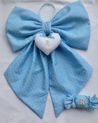 Fiocchi nascita e torte di pannolini