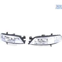 FARI PER OPEL VECTRA B 99-02 FONDO CROMATO