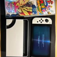 Nintendo switch Oled + 2 giochi + borsa