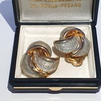 Coppia di orecchini dorati vintage anni ’60 a clip