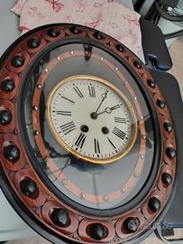 Orologio antico a pendolo occhio di bue