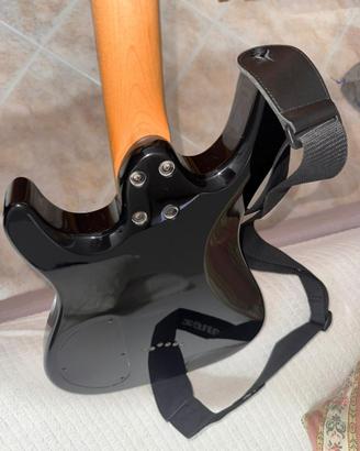 Chitarra elettrica Cort con amplificatore